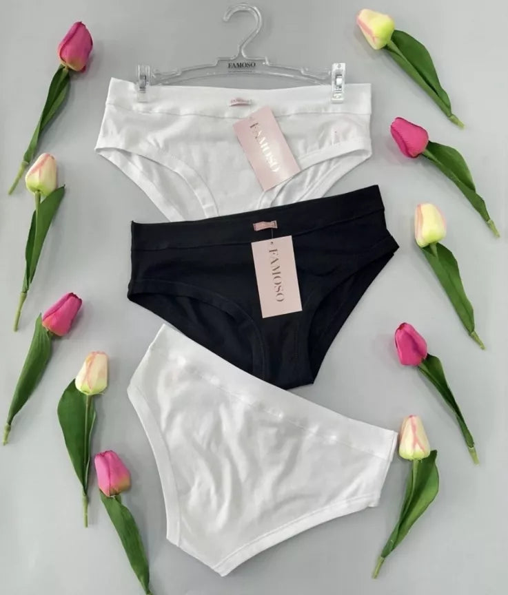 Three pairs of underwear in black, white, and a patterned color on a gray background with tulips.