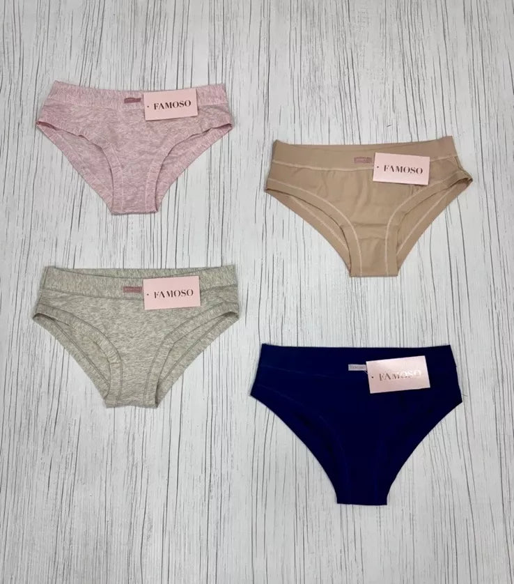 Four pairs of underwear in different colors with 'FAMOSO' branding on a wooden surface.